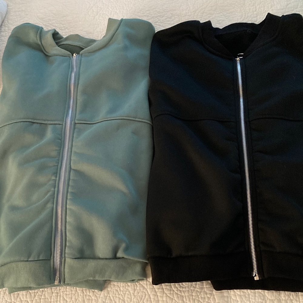 Black and Green Zip-Up sweatshirts, no hoods.